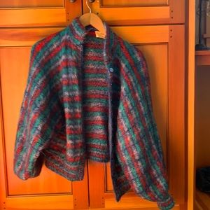 Hand knit sweater, size large but style fits most bodies!
